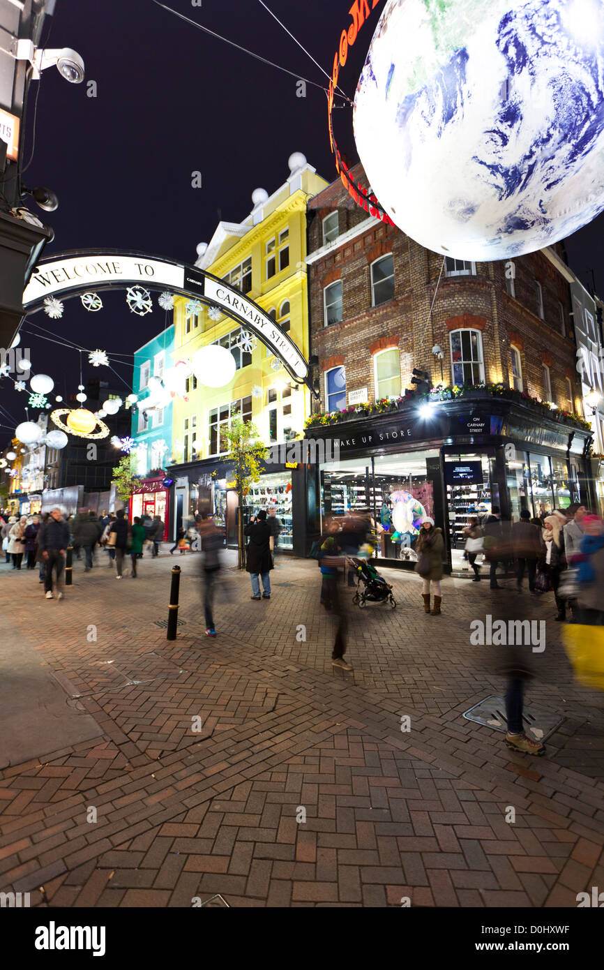 Christmas lights on display in Carnaby Street in London. Stock Photo