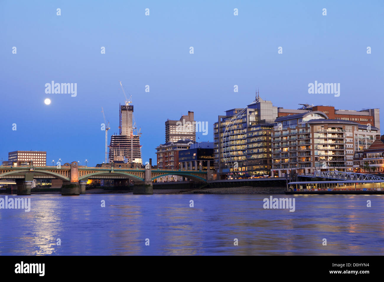 A view of the south embankment and the Shard building at London Bridge. Stock Photo