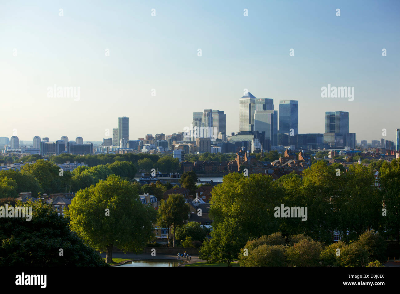 A view of Canary Wharf from Greenwich Park and the Royal Observatory. Stock Photo