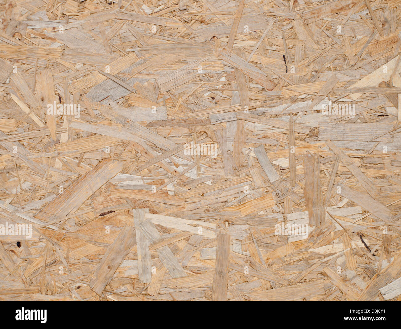 Closeup of pressed wood fiber panel, plywood, from a building site in