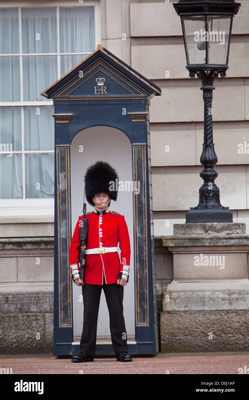 A view of the Queen's Guard on sentry duty outside Buckingham Palace. Stock Photo