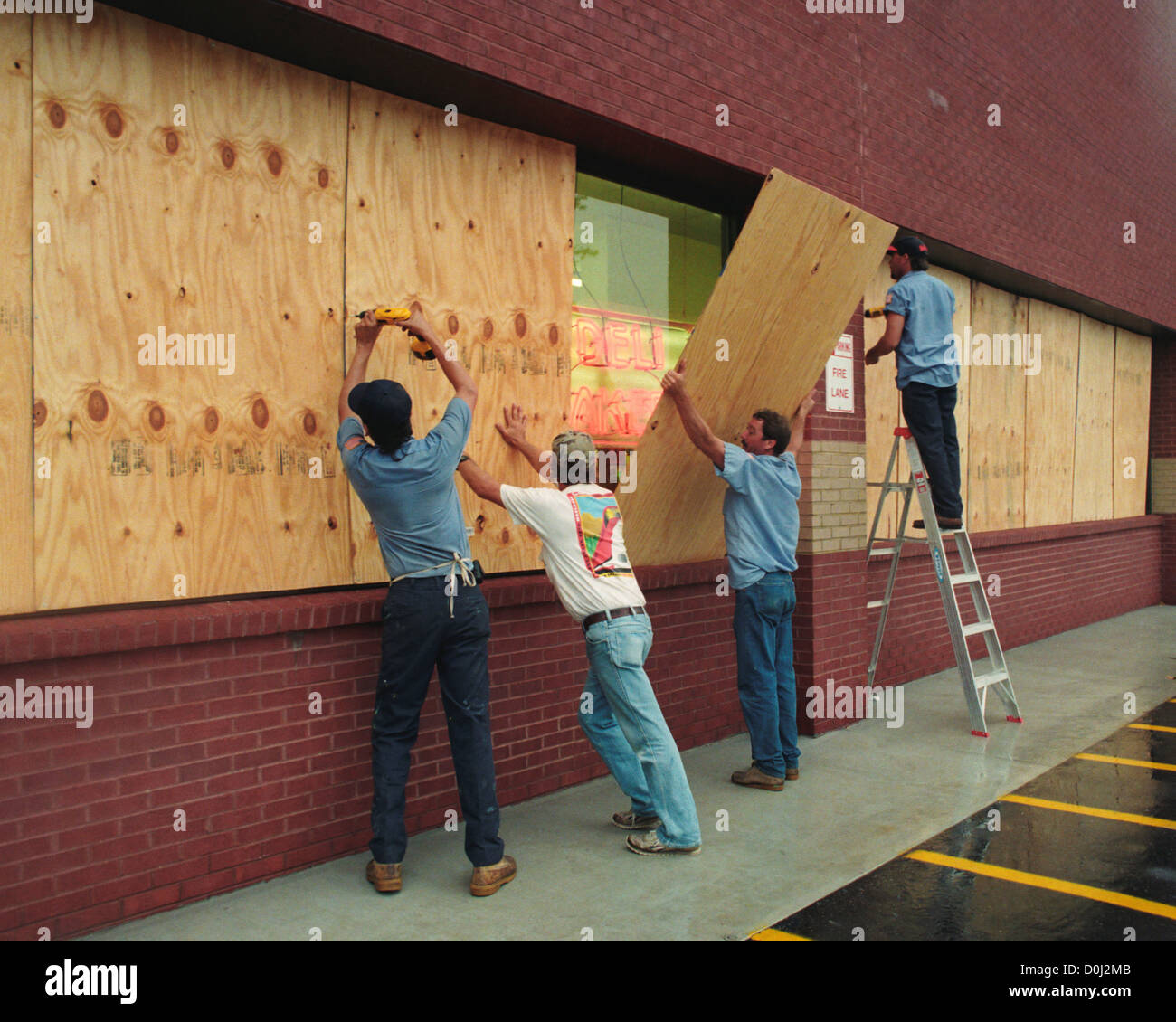 Boarding Up a Storefront Before the Arrival of Fran Stock Photo
