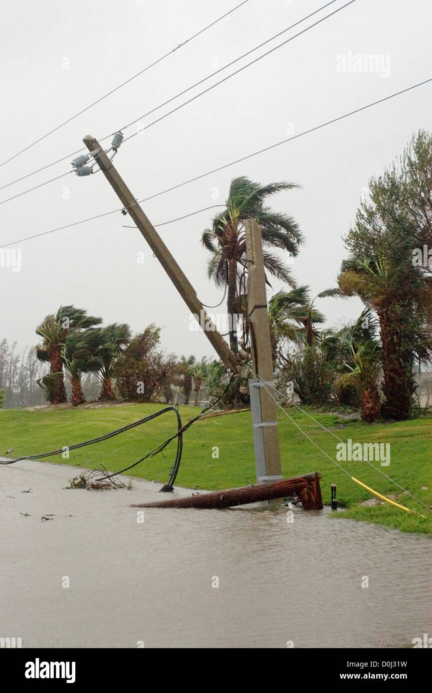 A Utility Pole Dangles by Lines After Being Snapped by Jeanne's Winds Stock Photo