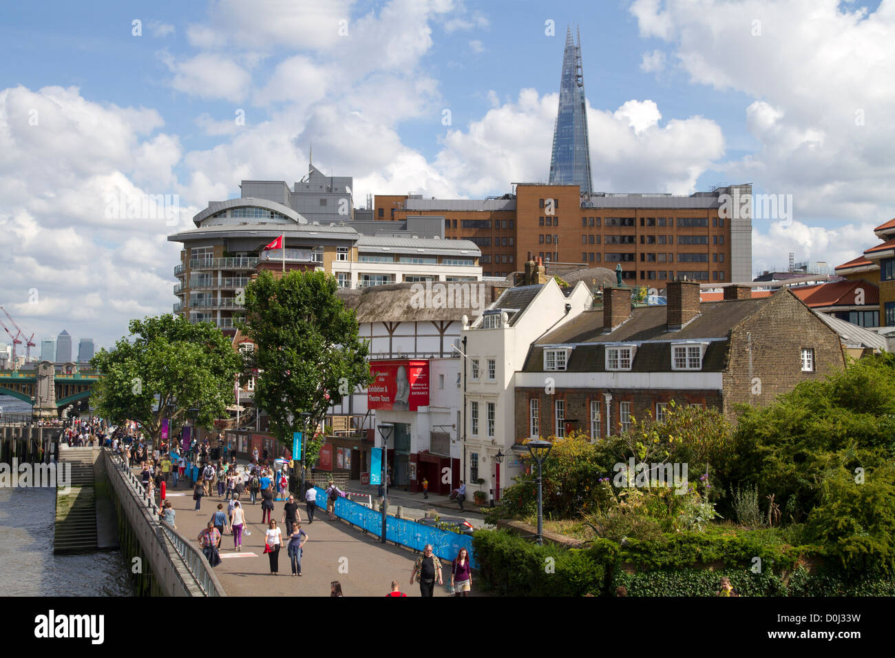 Shakespeare's Globe theatre on the south bank of the Thames with the Shard building in the background. Stock Photo