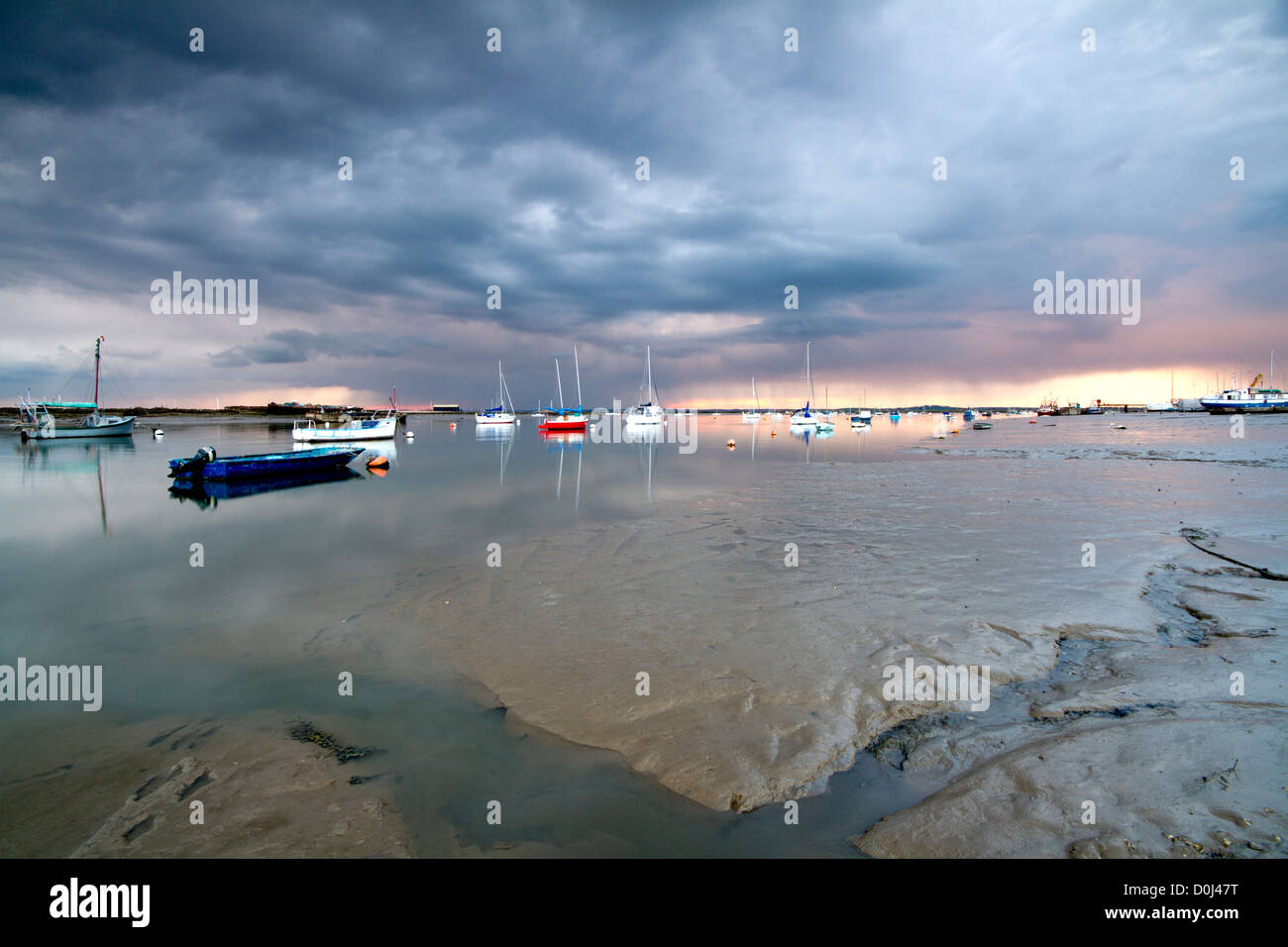 Mersea Island at sunset with a rain storm approaching. Stock Photo