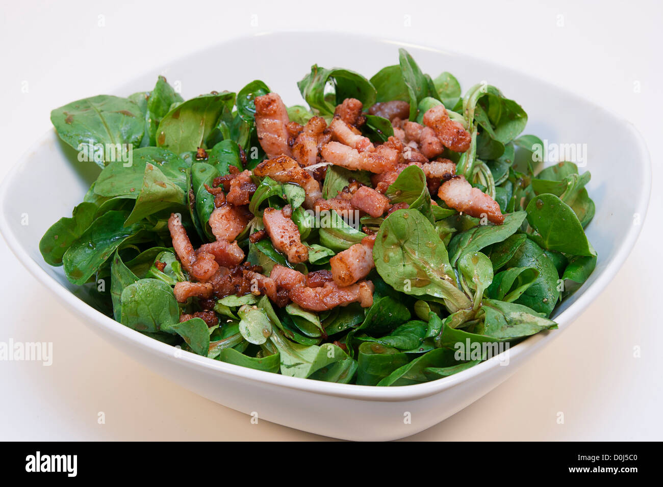 Lettuce salad with bacon Stock Photo
