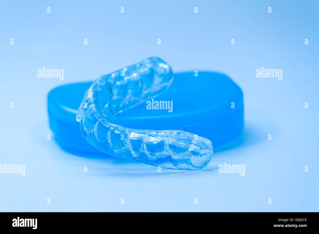 Teeth bruxism guard on white Stock Photo