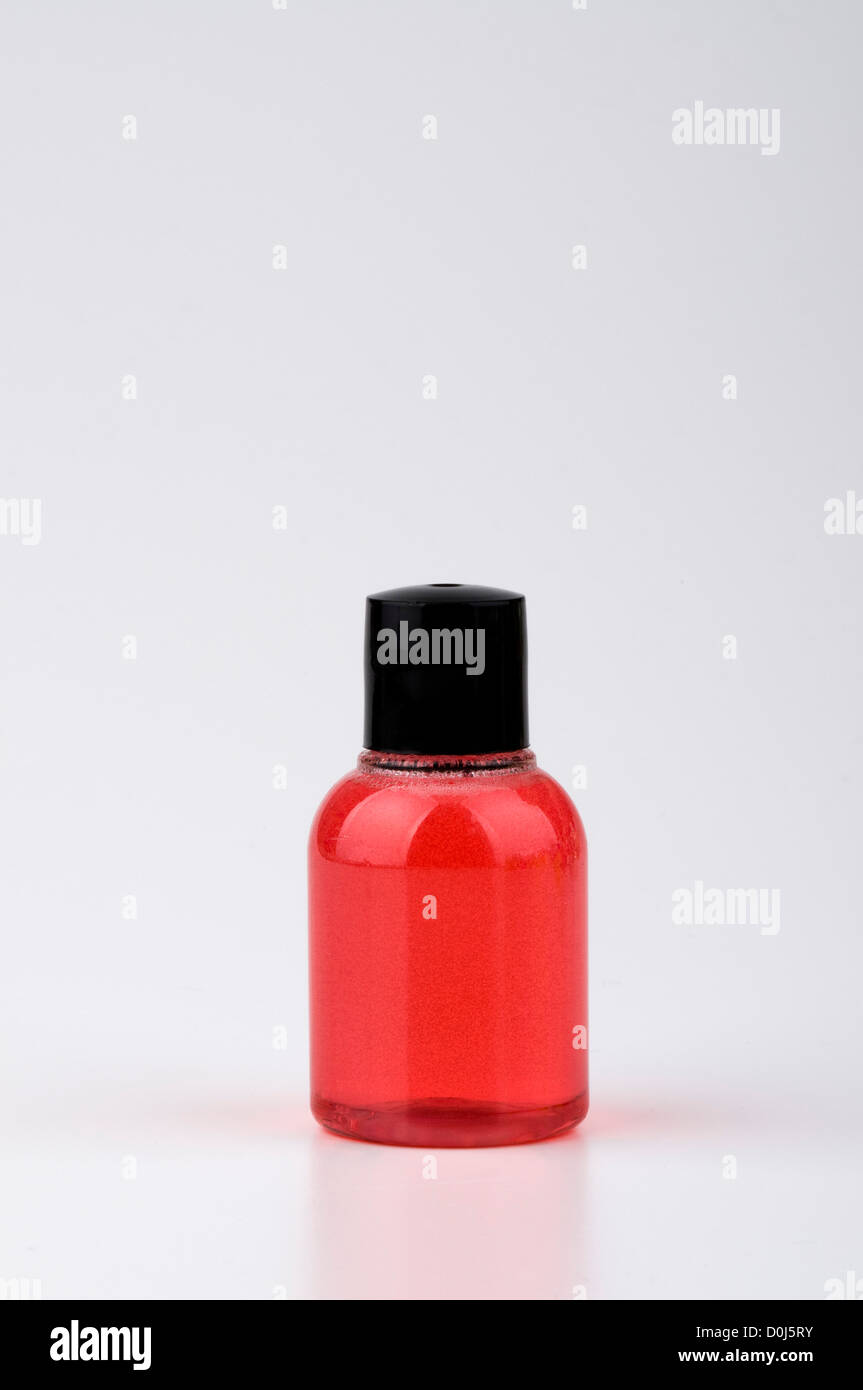 Red color bottle of shampoo Stock Photo Alamy