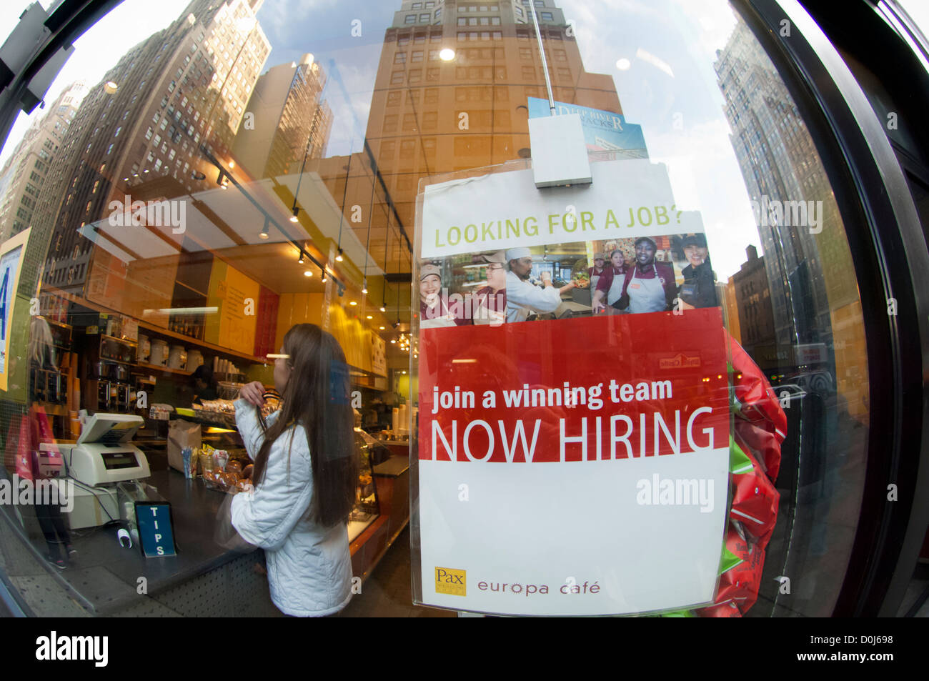 A hiring center posted in the window of a cafe in midtown in New York on Friday, November 23, 2012. (© Frances M. Roberts) Stock Photo