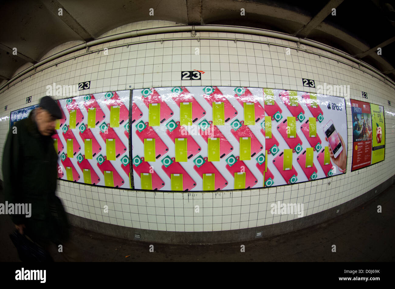 Advertising for the Apple's line of iPods in a subway station in New York on Thursday, November 22, 2012. (© Frances M. Roberts) Stock Photo