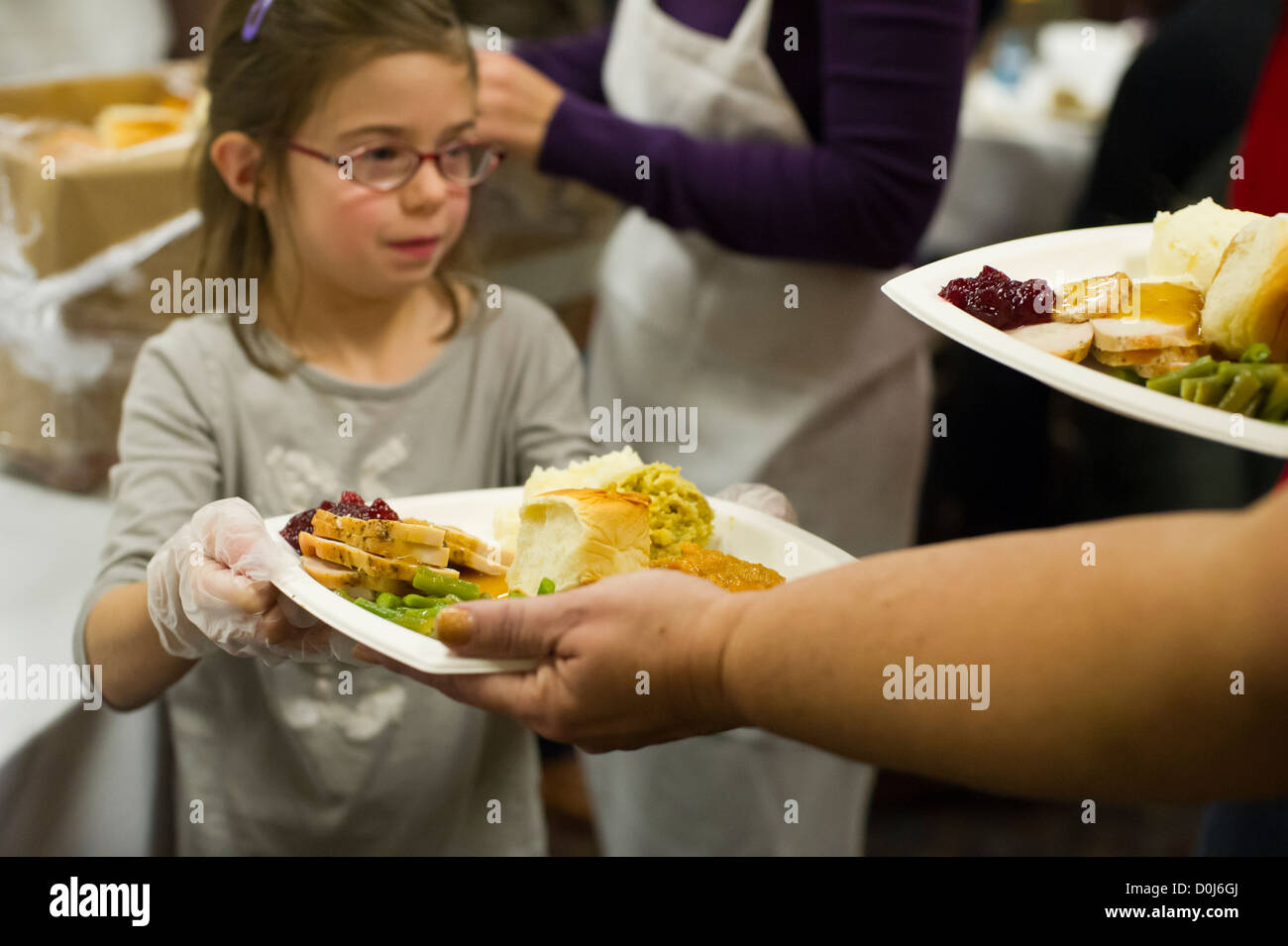 Volunteers for the Salvation Army serve Thanksgiving Dinner to the