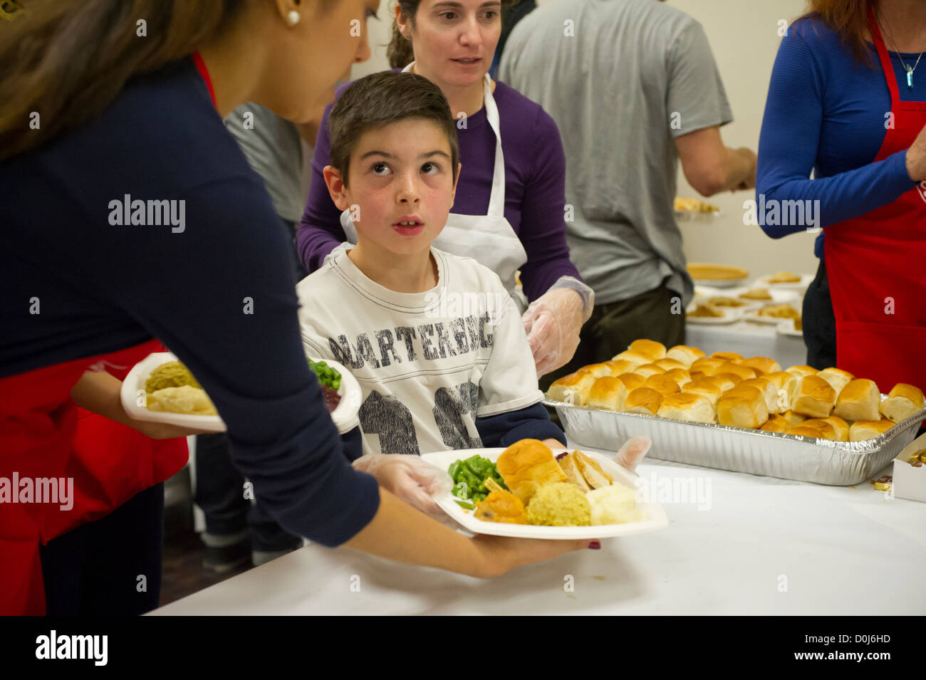 Volunteers for the Salvation Army serve Thanksgiving Dinner to the