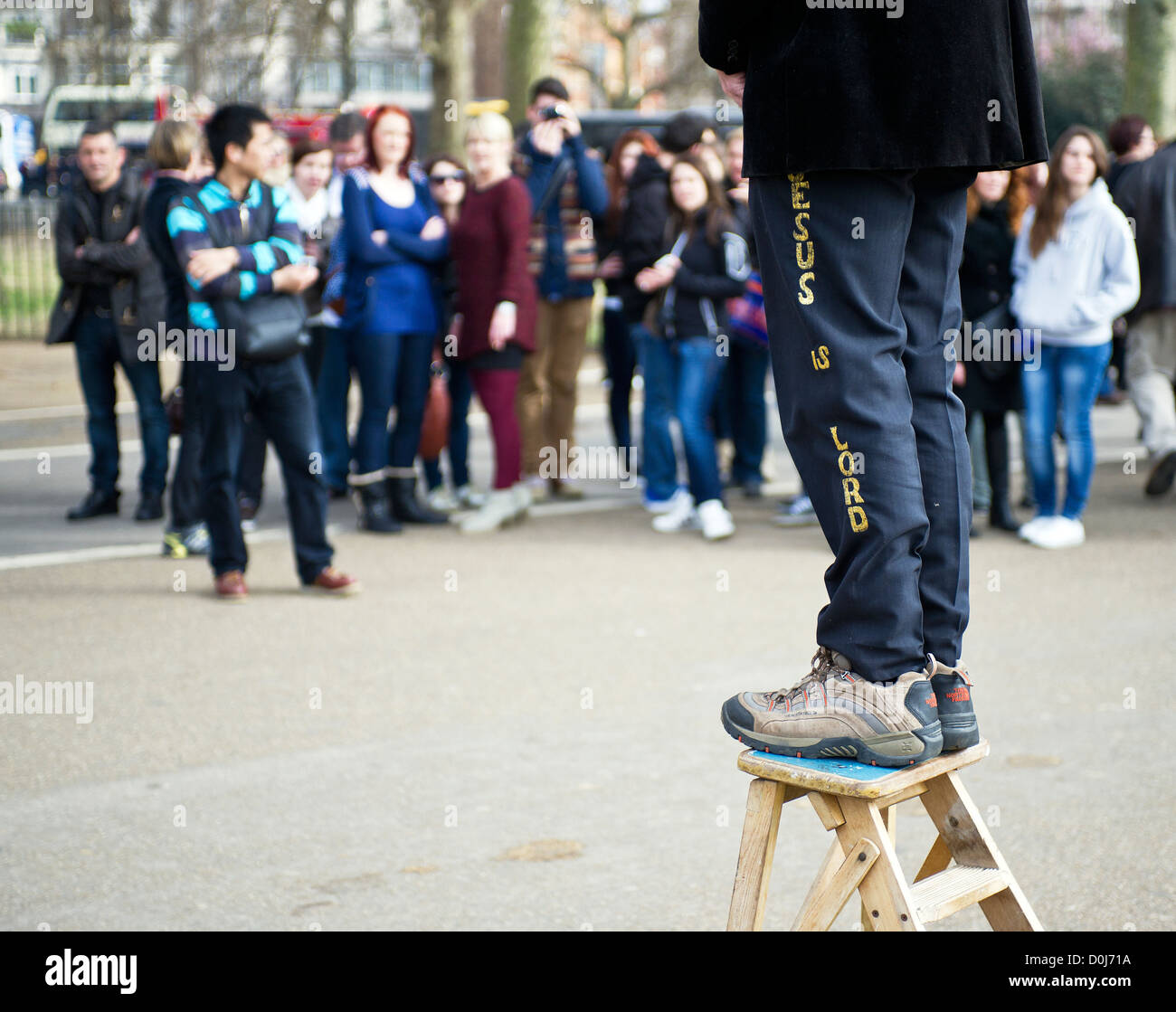 A man standing on a wooden stepladder at Speakers Corner in London. Stock Photo