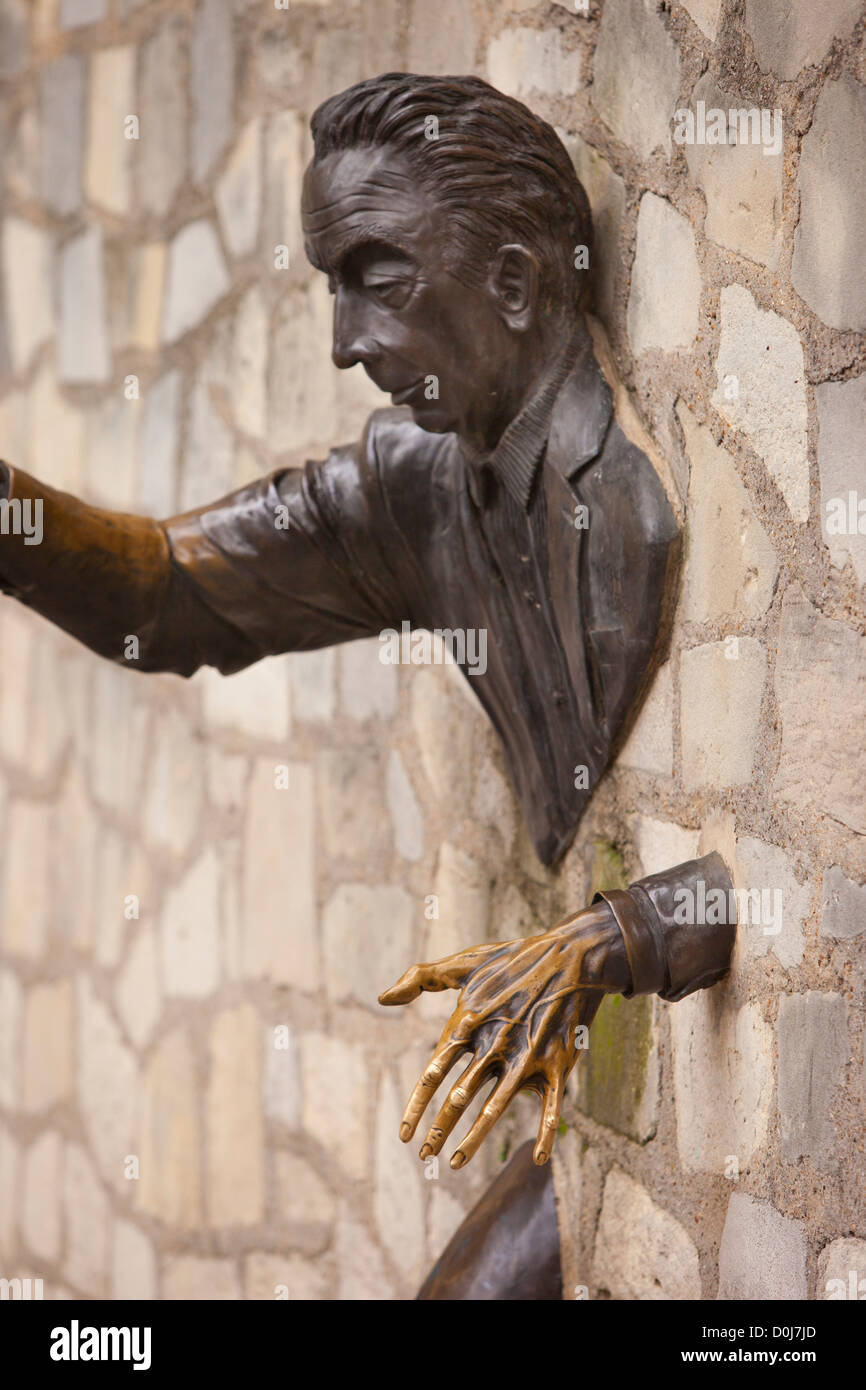 Jean Marais' Statue of Marcel Ayme based on Ayme's story 'The Walker  Through Walls,' Montmartre, Paris France Stock Photo - Alamy