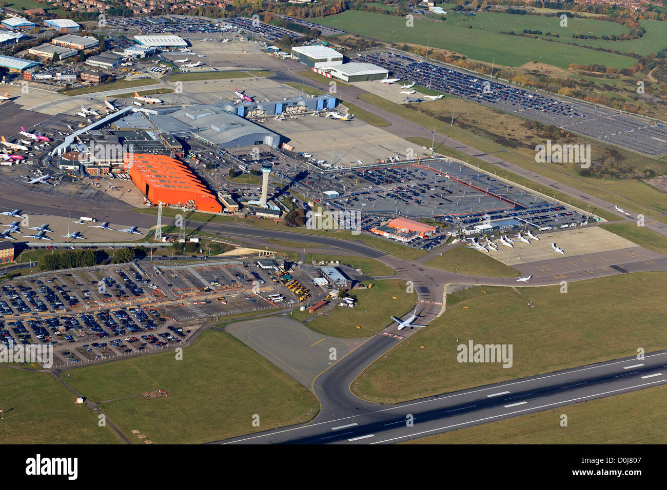 Aerial view of the main terminal with control tower and apron at London Luton Airport. Stock Photo