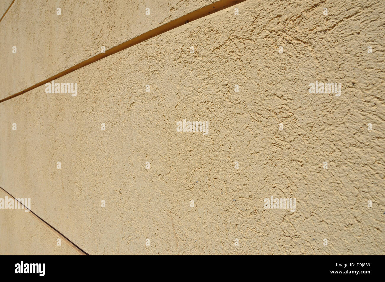 Granular textured factory wall macro. Abstract architectural background ...