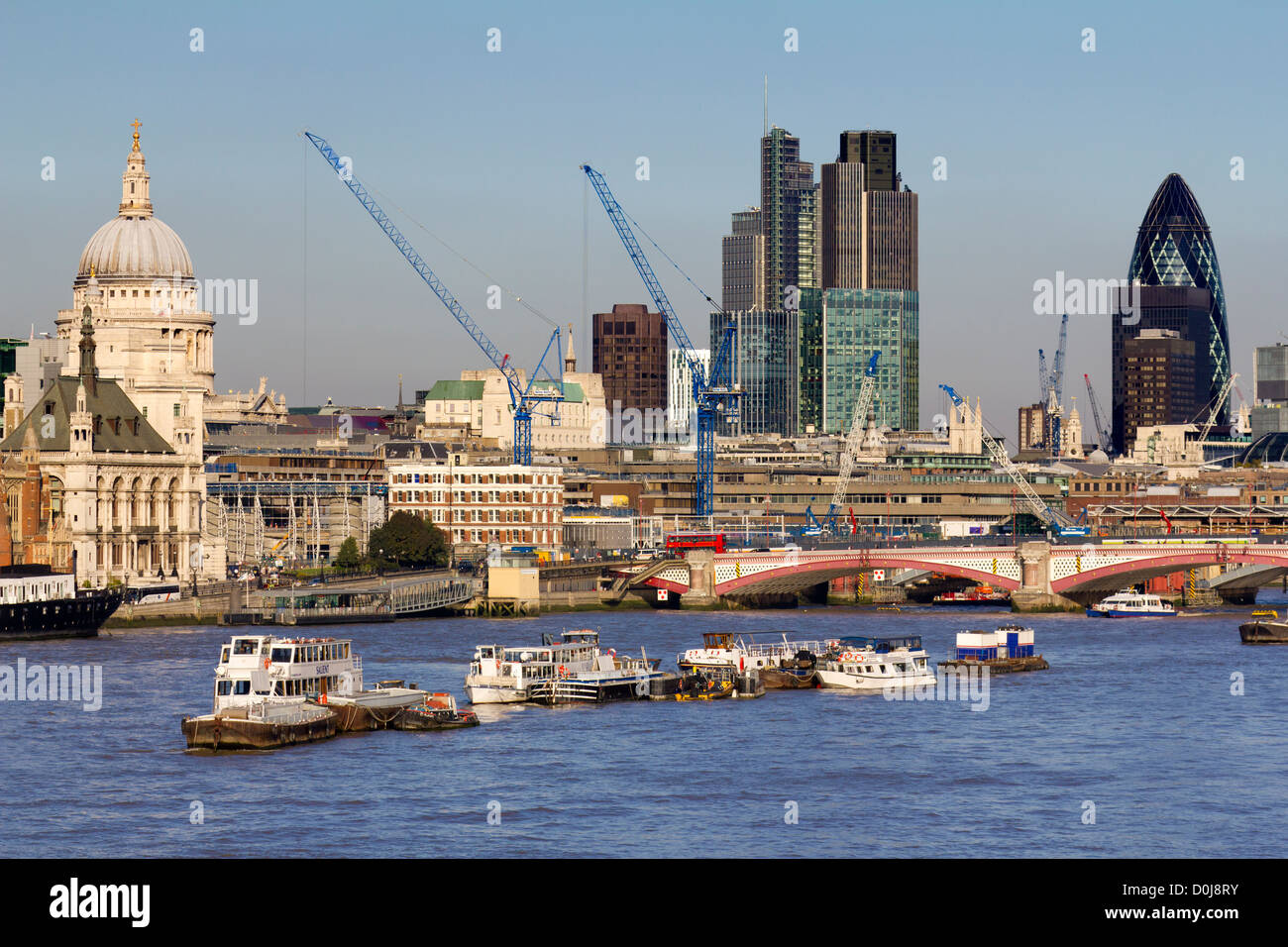 Iconic London skyline viewed from Waterloo Bridge in autumn. Stock Photo
