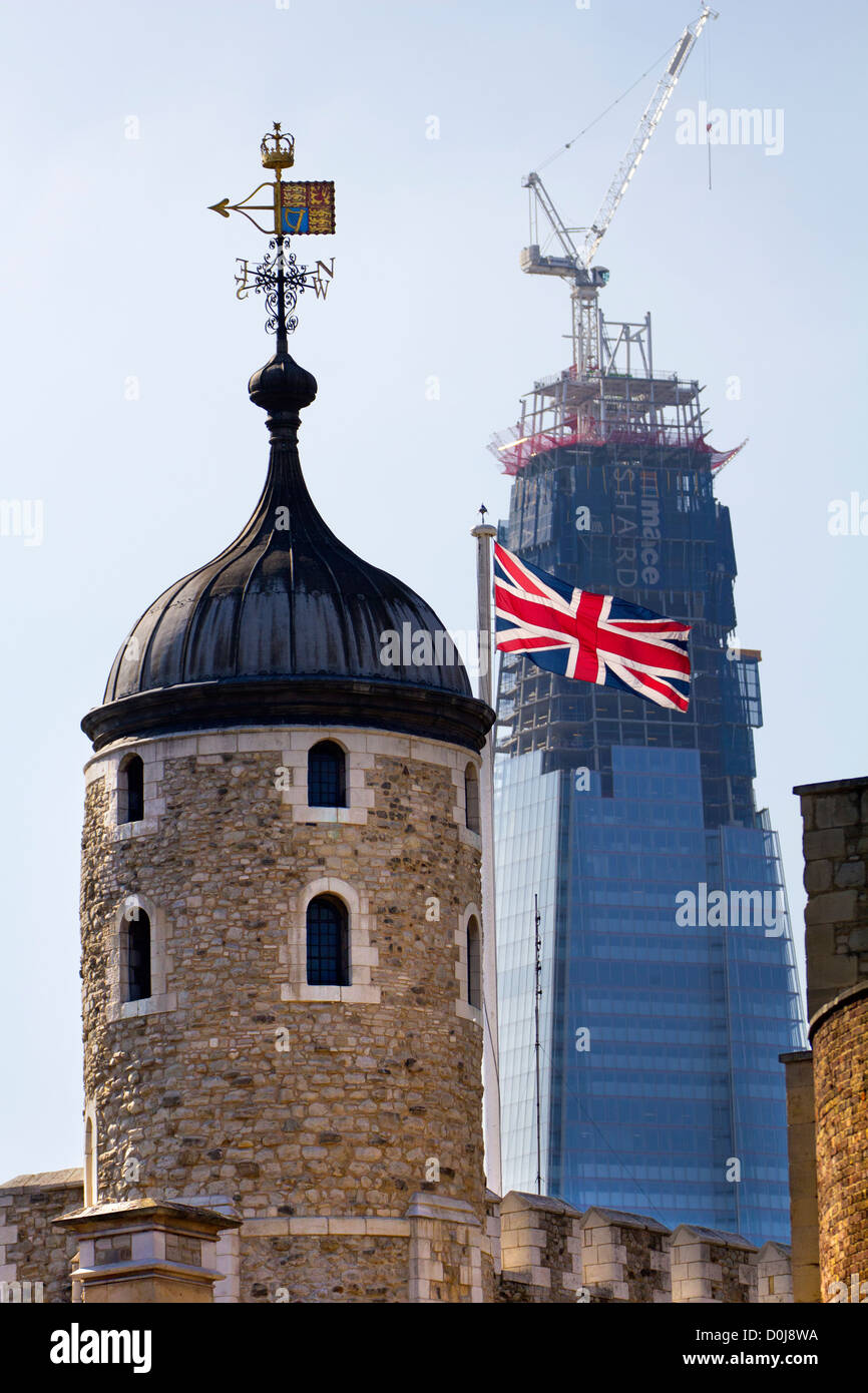A view toward the Tower of London with the Shard under construction in the background. Stock Photo