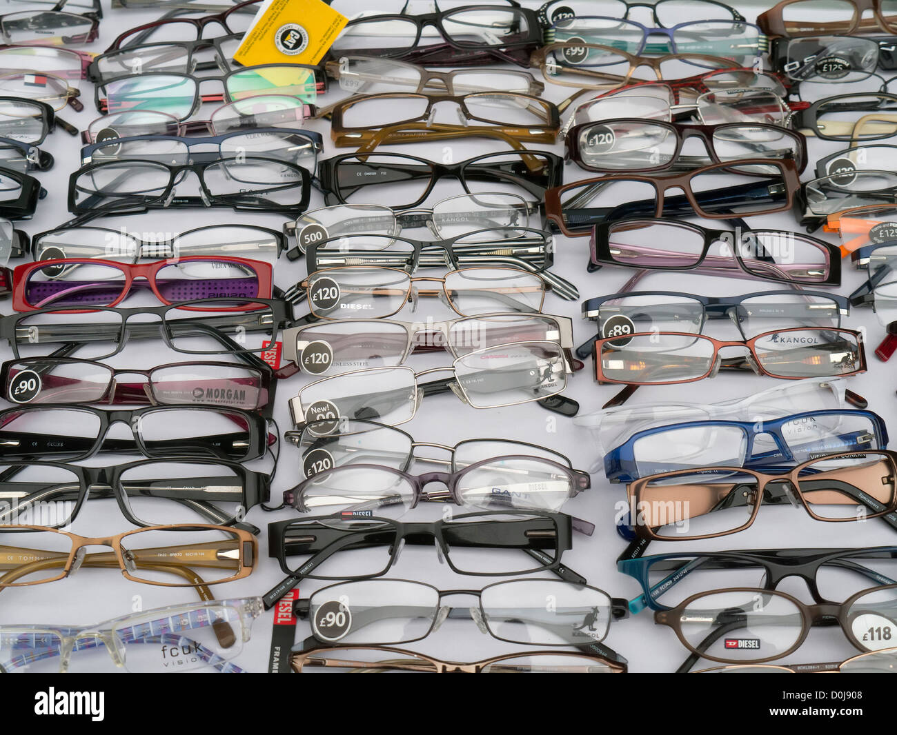 A display of glasses at Portobello Road market in London. Stock Photo