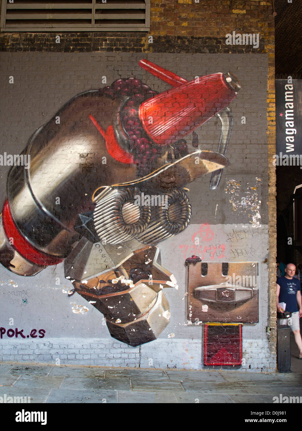 Bizarre mechanical graffiti near to London Bridge. Stock Photo