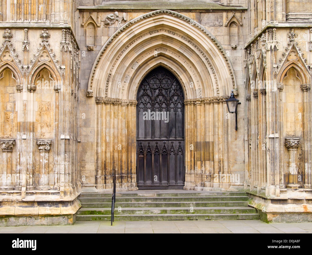 Grand door and arch on the West Front entrance of York Minster. Stock Photo