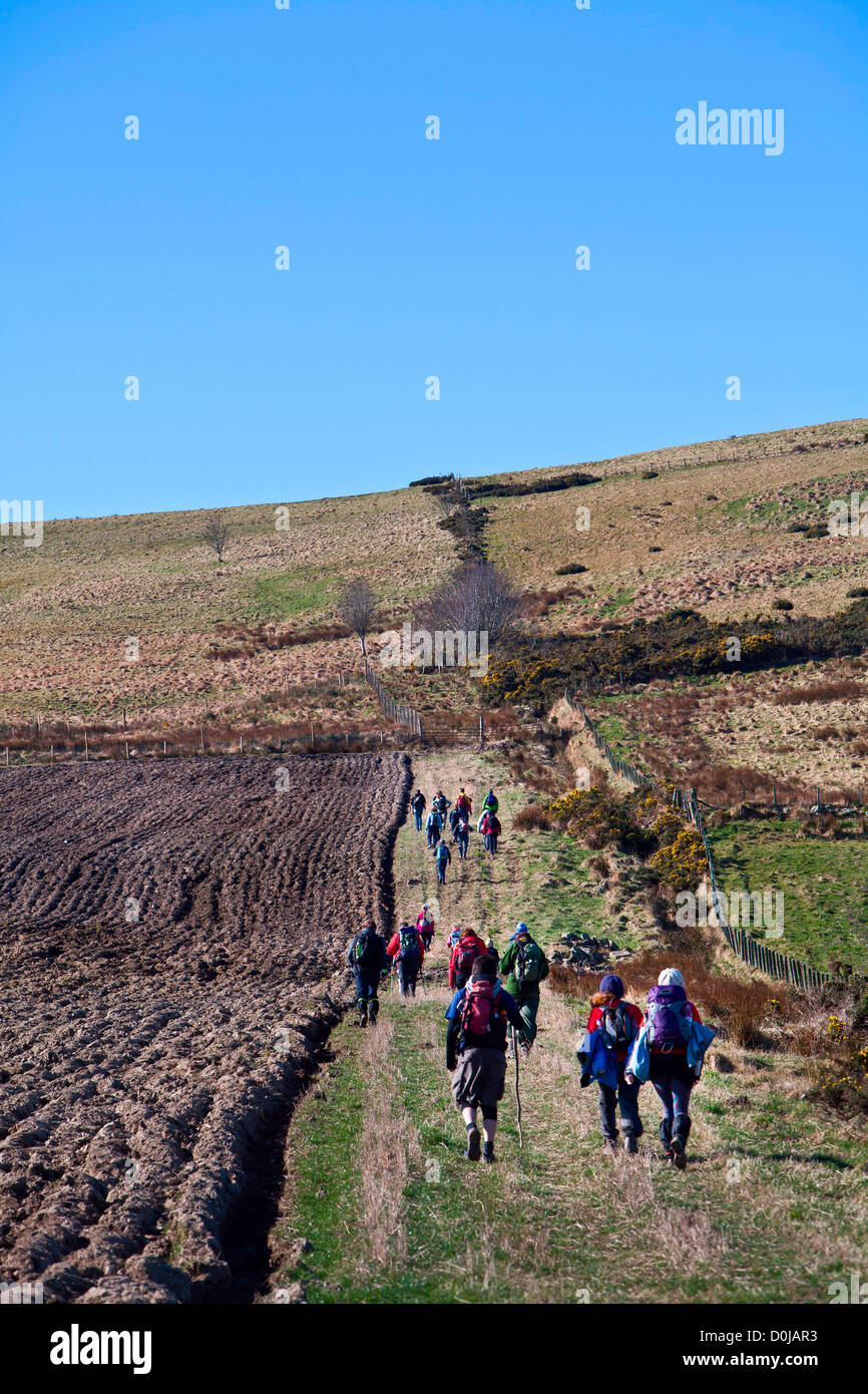 Hillwalkers on the Clashmach in Scotland. Stock Photo