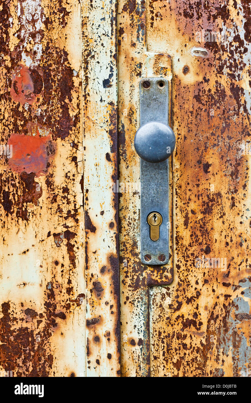 An old rusty gate door and lock Stock Photo