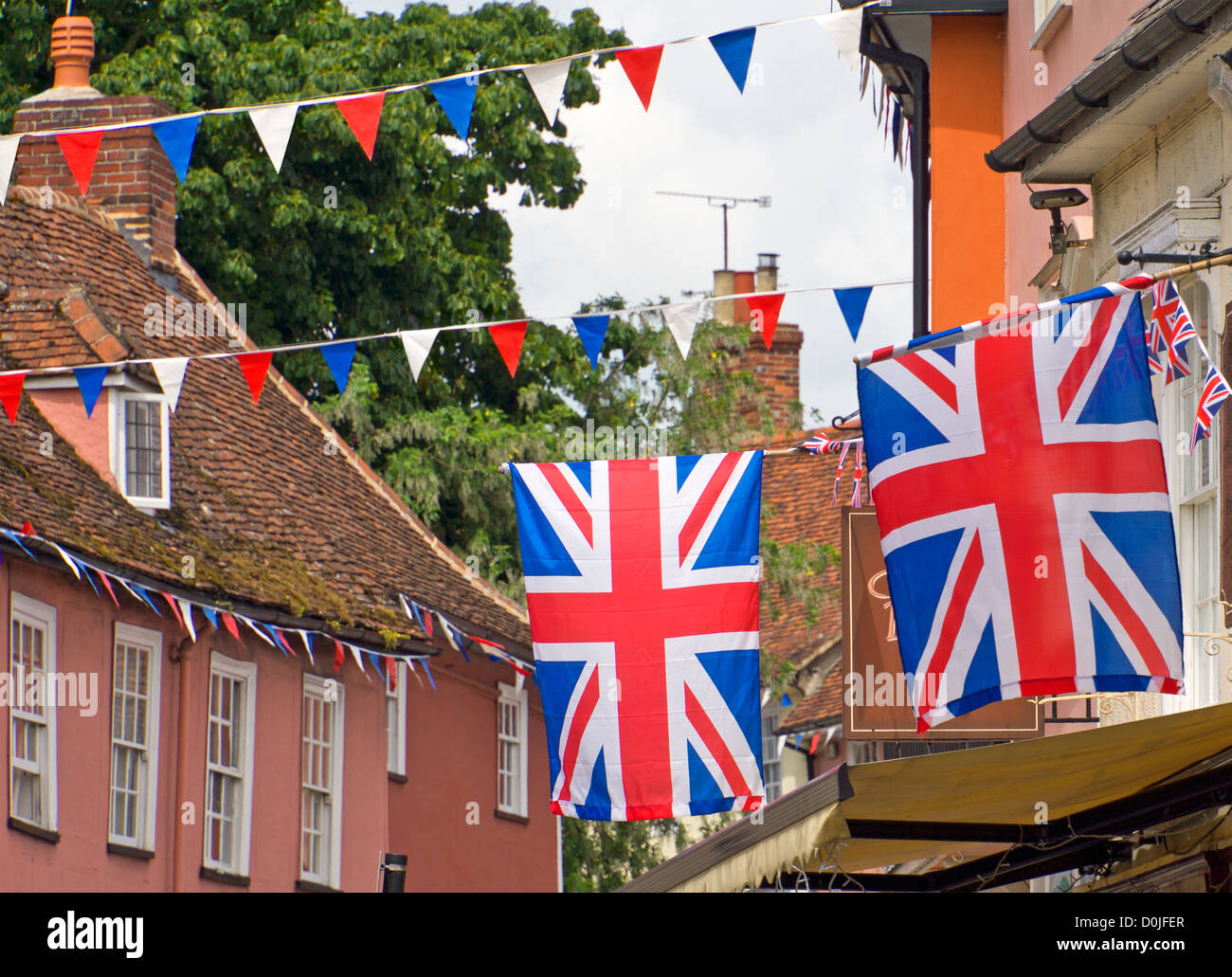 Union Jack flags and red white and blue bunting flying in Thaxted Stock ...