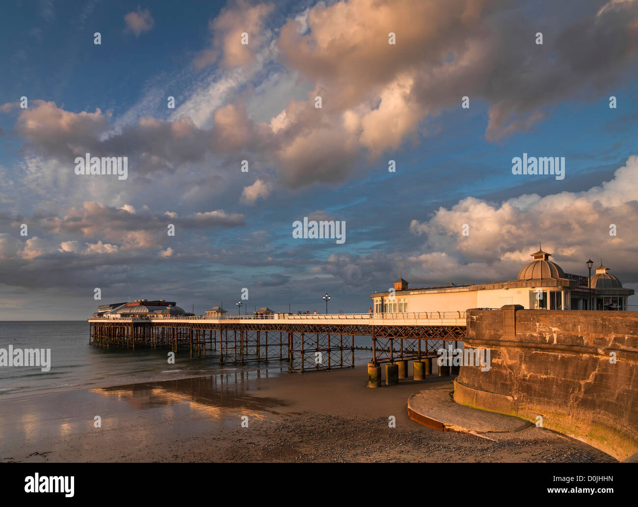 Cromer Pier in the early evening sun. Stock Photo