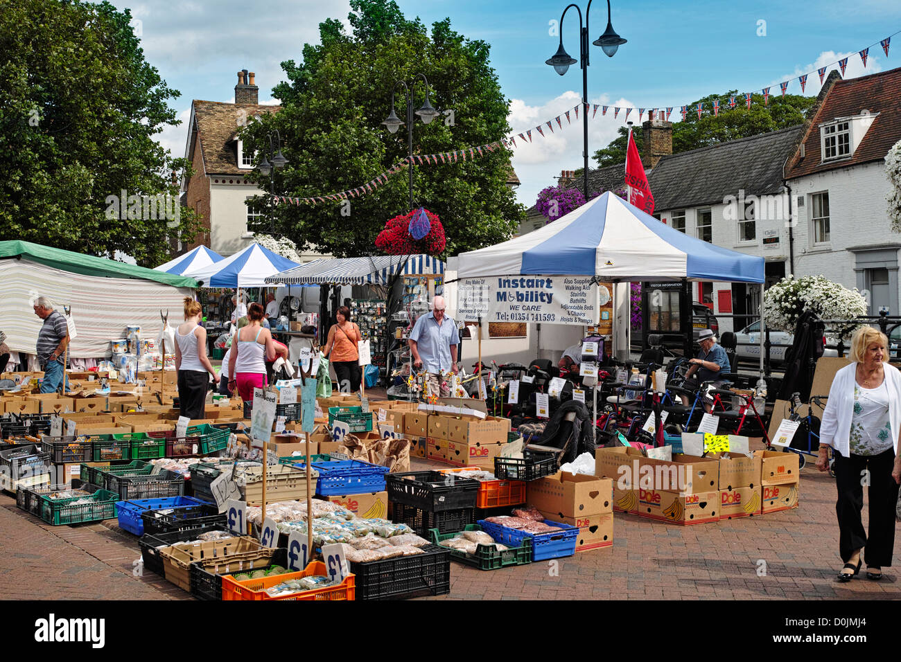 A view across stalls on Ely market place. Stock Photo
