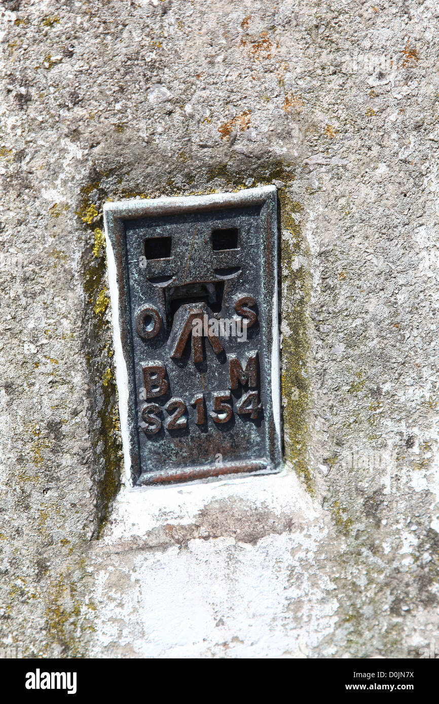 An Ordnance Survey bench mark on a triangulation or trig pillar Stock Photo