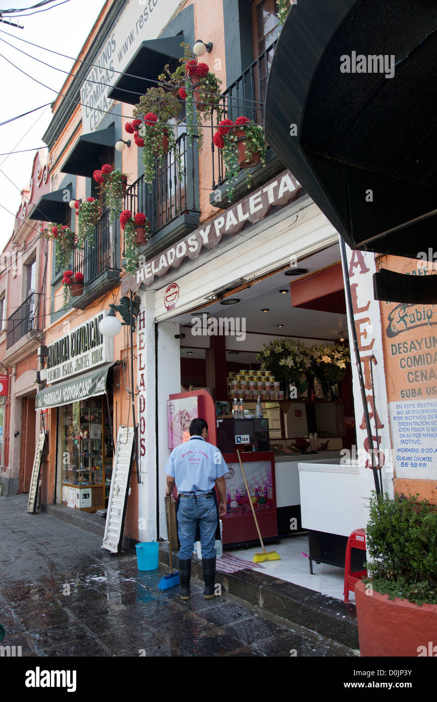 Shop Fronts and Sidewalk on Ignacio Allende in Coyoacán in Mexico City DF Stock Photo