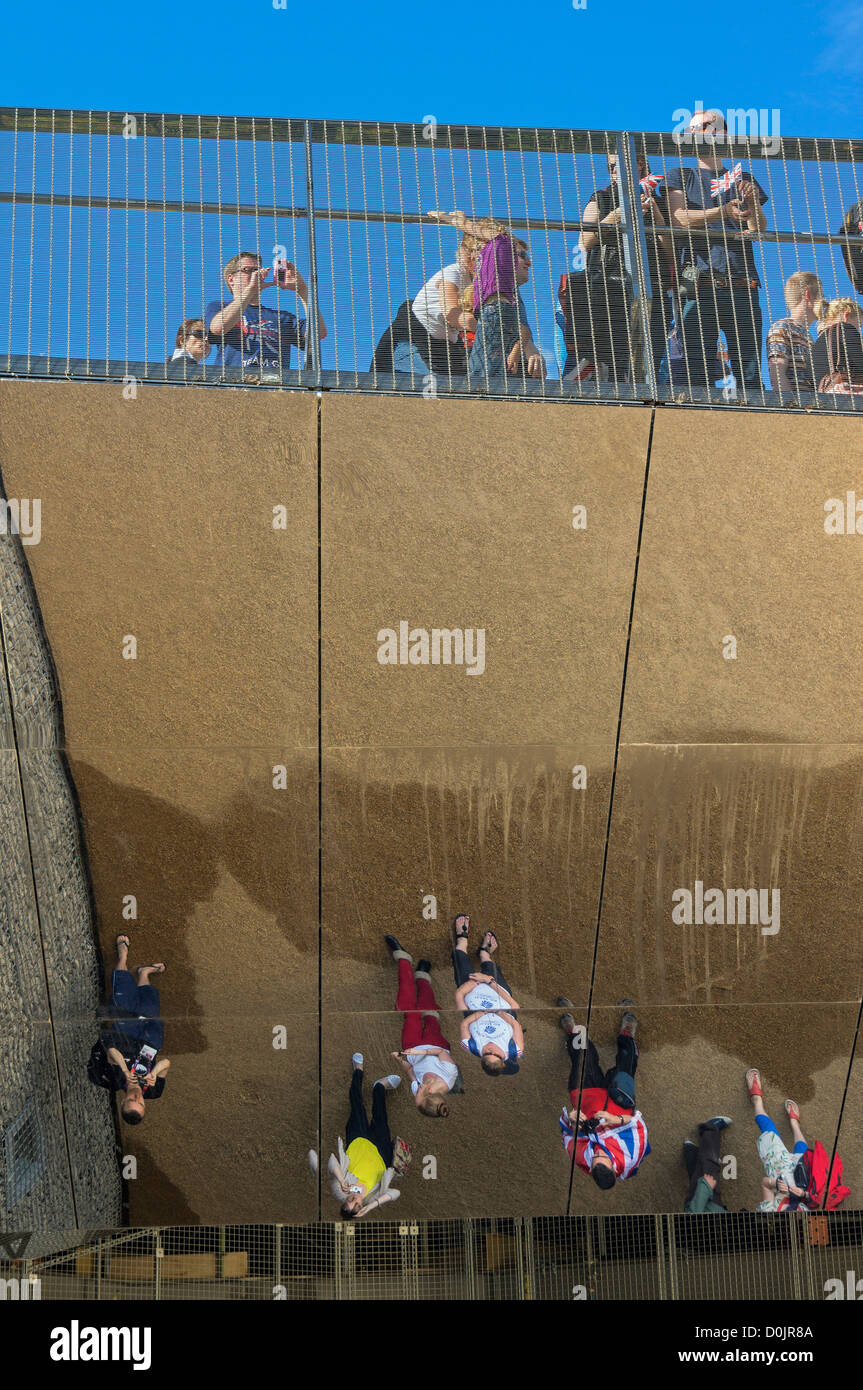 People reflected in the underside of a bridge in Newham. Stock Photo