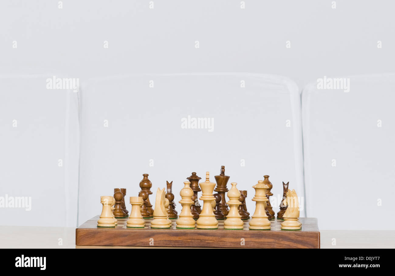 Chessboard on a table Stock Photo