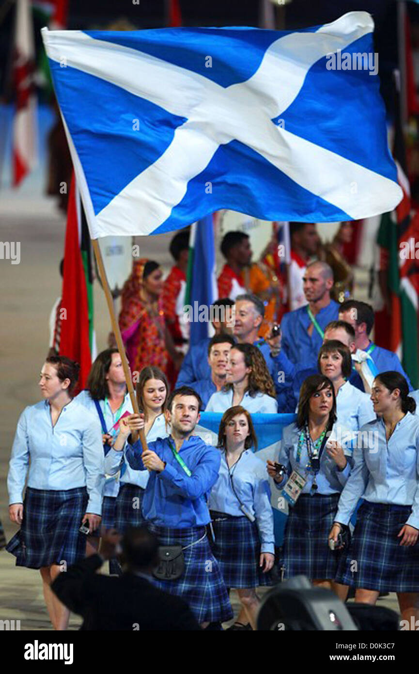 Ross Edgar of Scotland carries his nation's flag during the Opening Ceremony for the Delhi 2010 Commonwealth Games at Stock Photo
