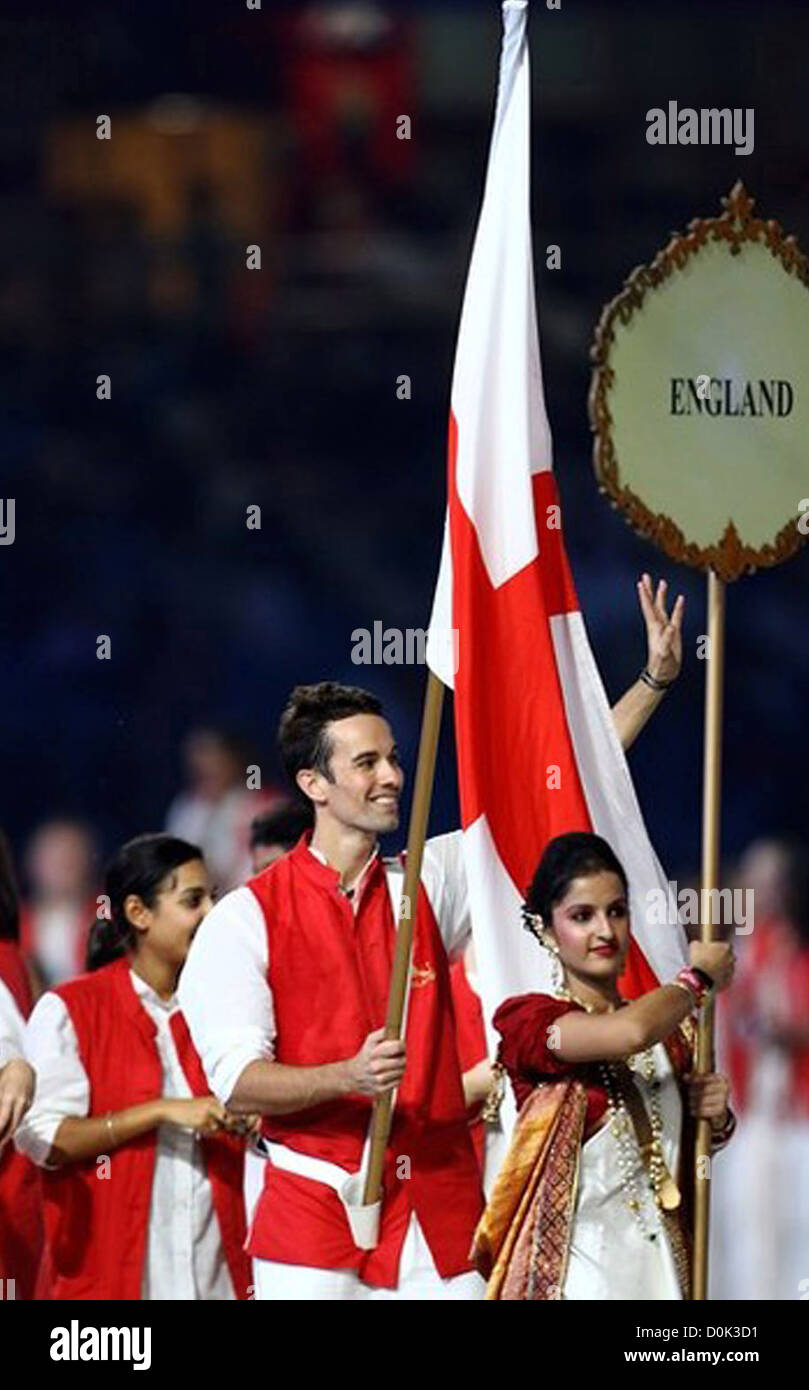Nathan Robertson of England carries his nation's flag during the Opening Ceremony for the Delhi 2010 Commonwealth Games at Stock Photo