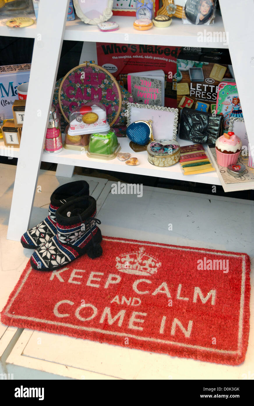 Keep Calm and Come in sign in a shop window. Stock Photo