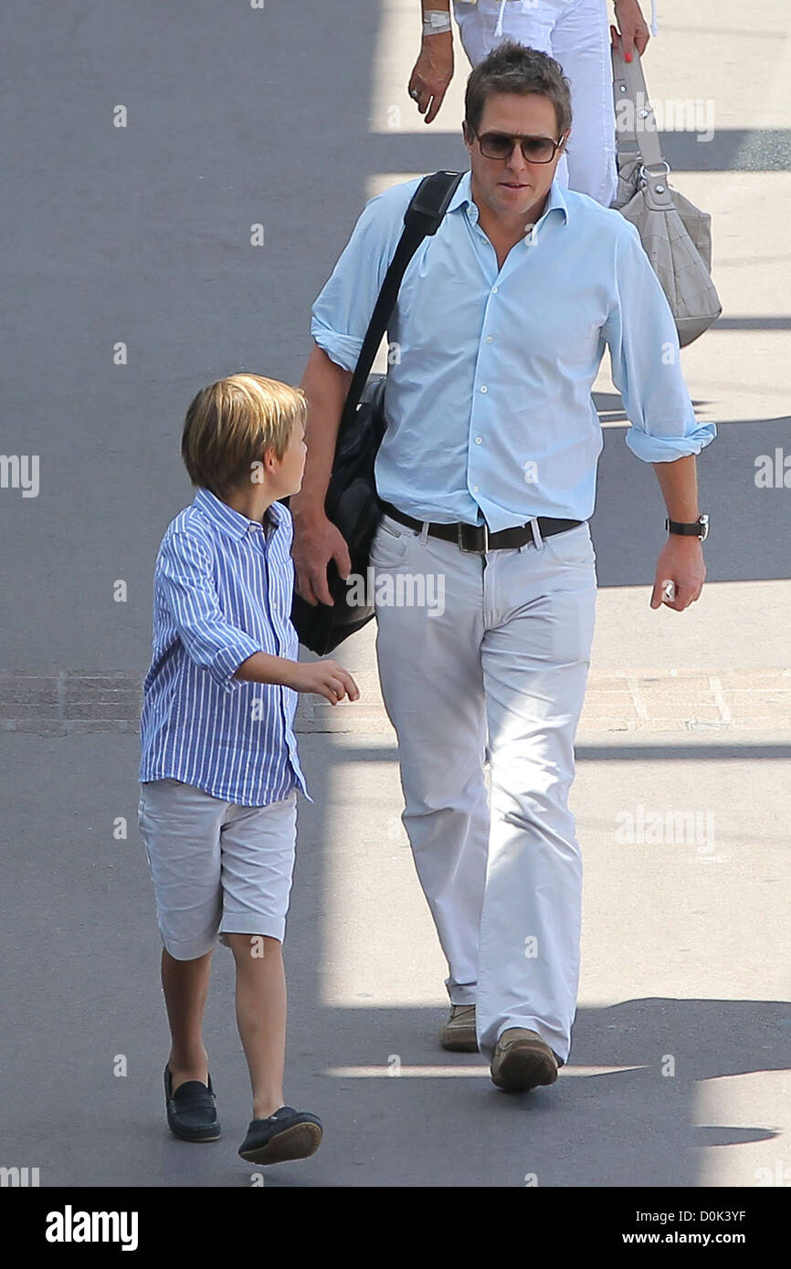 Hugh Grant is met at Nice airport by Damian Hurley, son of his ex ...