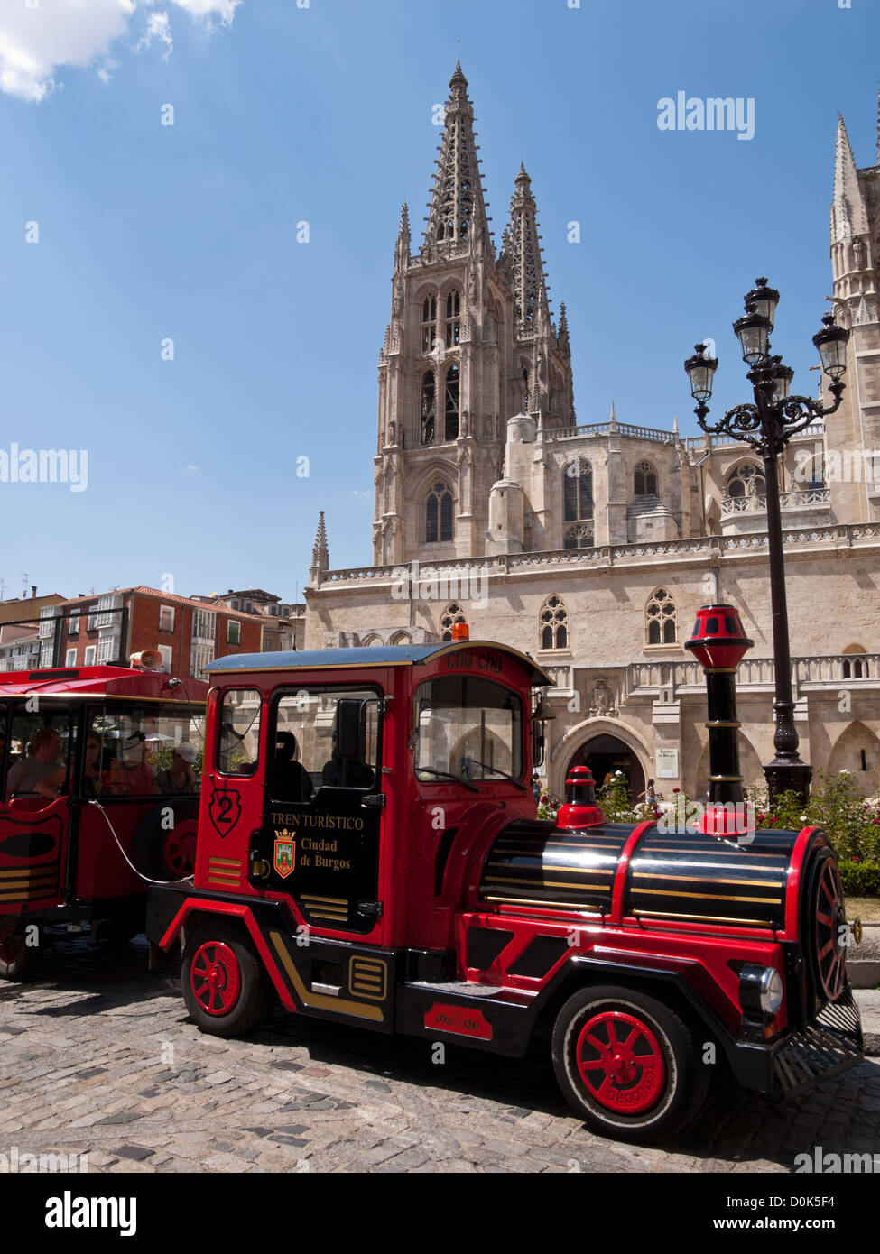 Touristic train near the Cathedral of Burgos, which is a Gothic-style Roman Catholic cathedral in Burgos, Spain Stock Photo