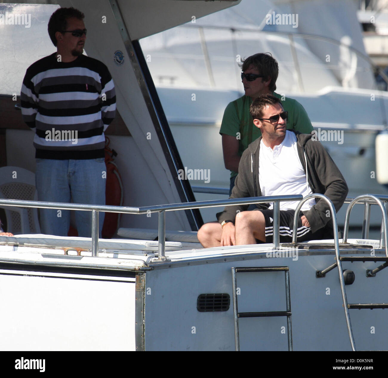 Hugh Jackman takes a ride on a boat Hugh Jackman and his son Oscar
