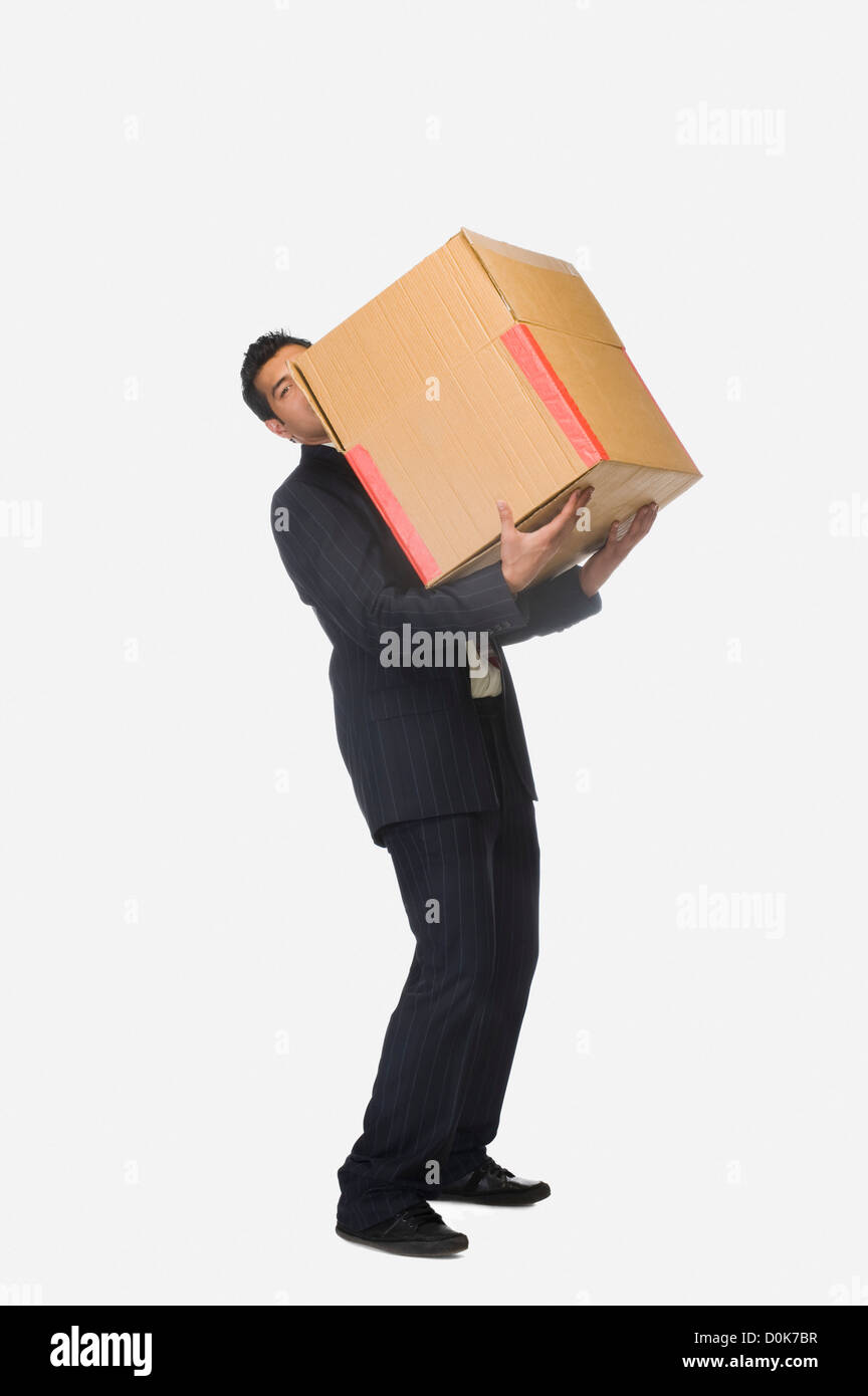 Worker carrying cardboard box hi-res stock photography and images - Alamy