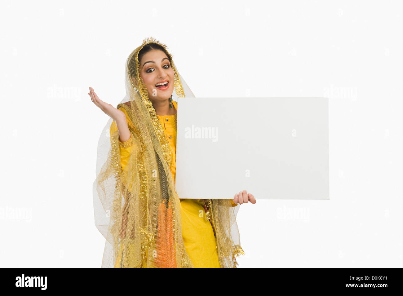 Woman in traditional Punjabi dress holding a placard Stock Photo Alamy