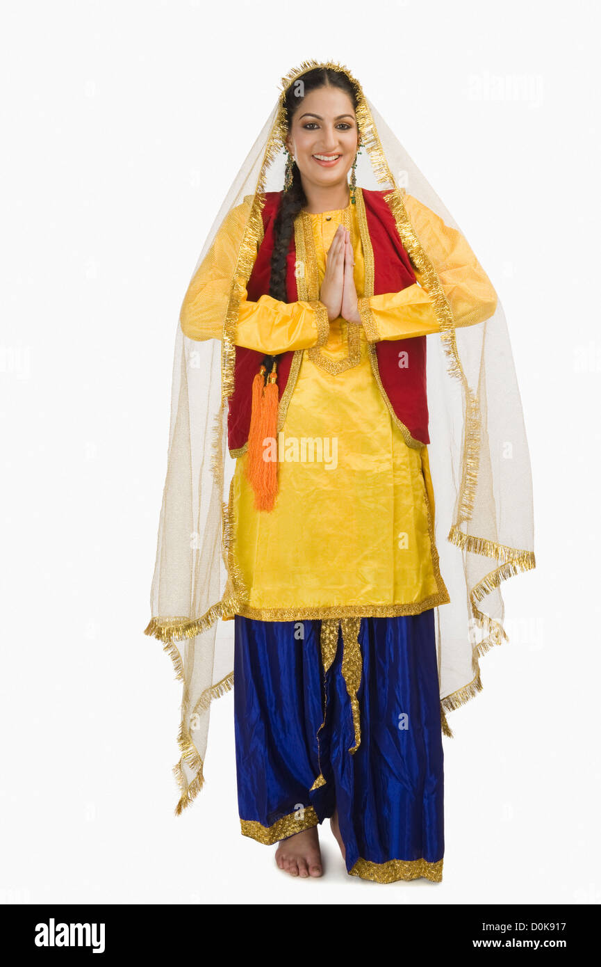 Woman in traditional Punjabi dress greeting Stock Photo - Alamy