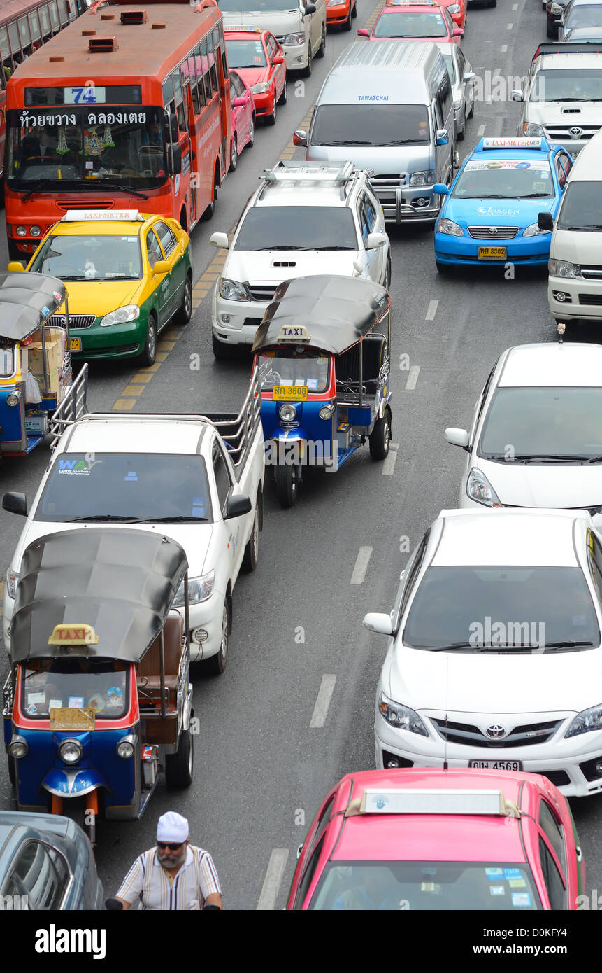 A tuk-tuk stuck in traffic in Bangkok, Thailand. Stock Photo