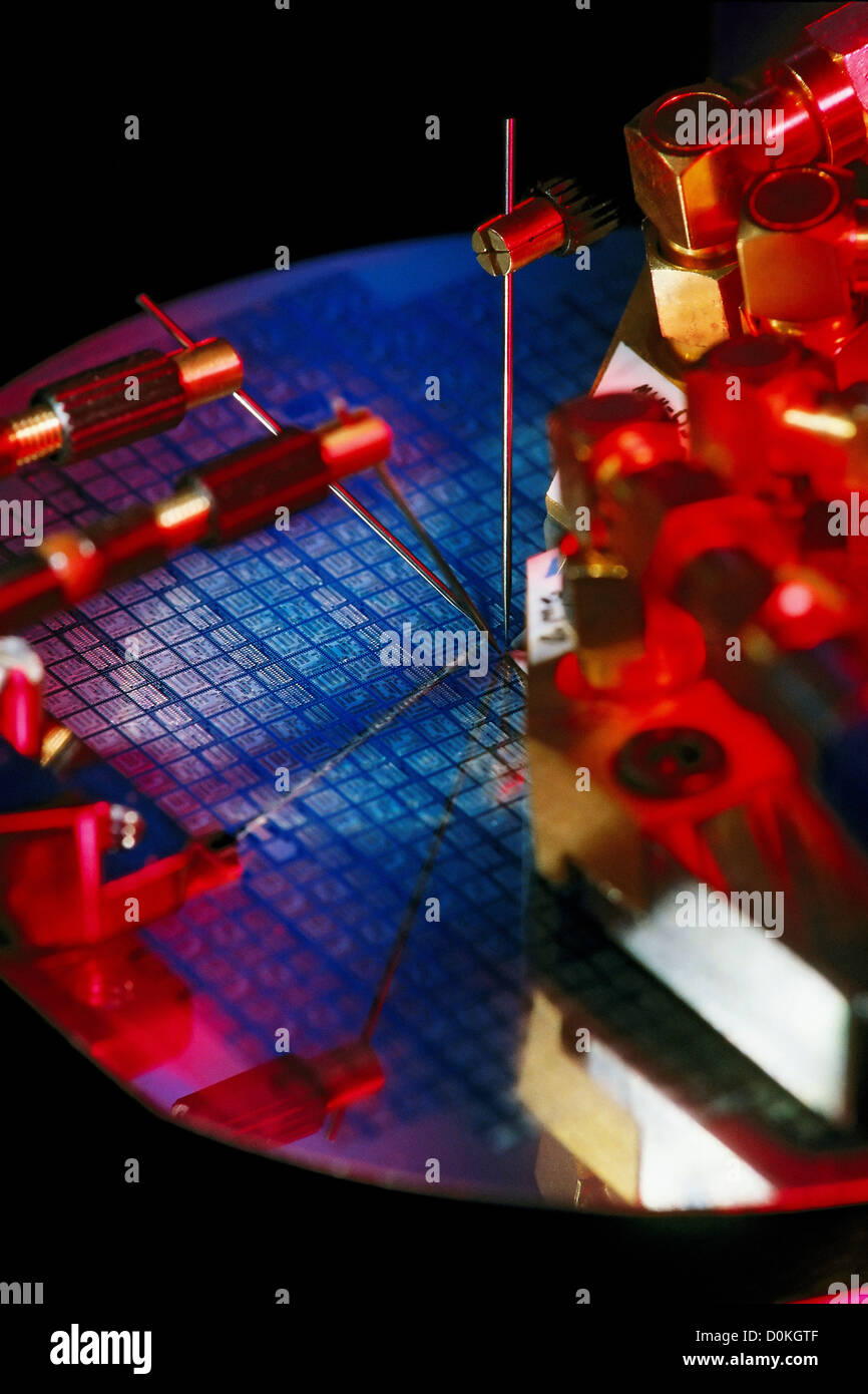 An integrated circuit wafer undergoing probe testing Stock Photo Alamy