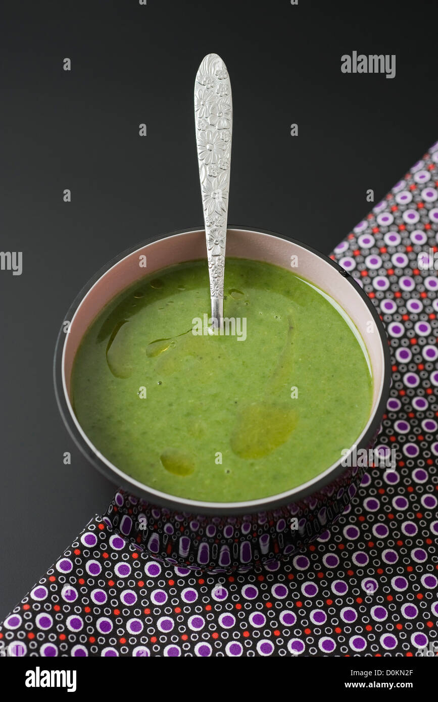 Spinach soup with rosemary oil Stock Photo