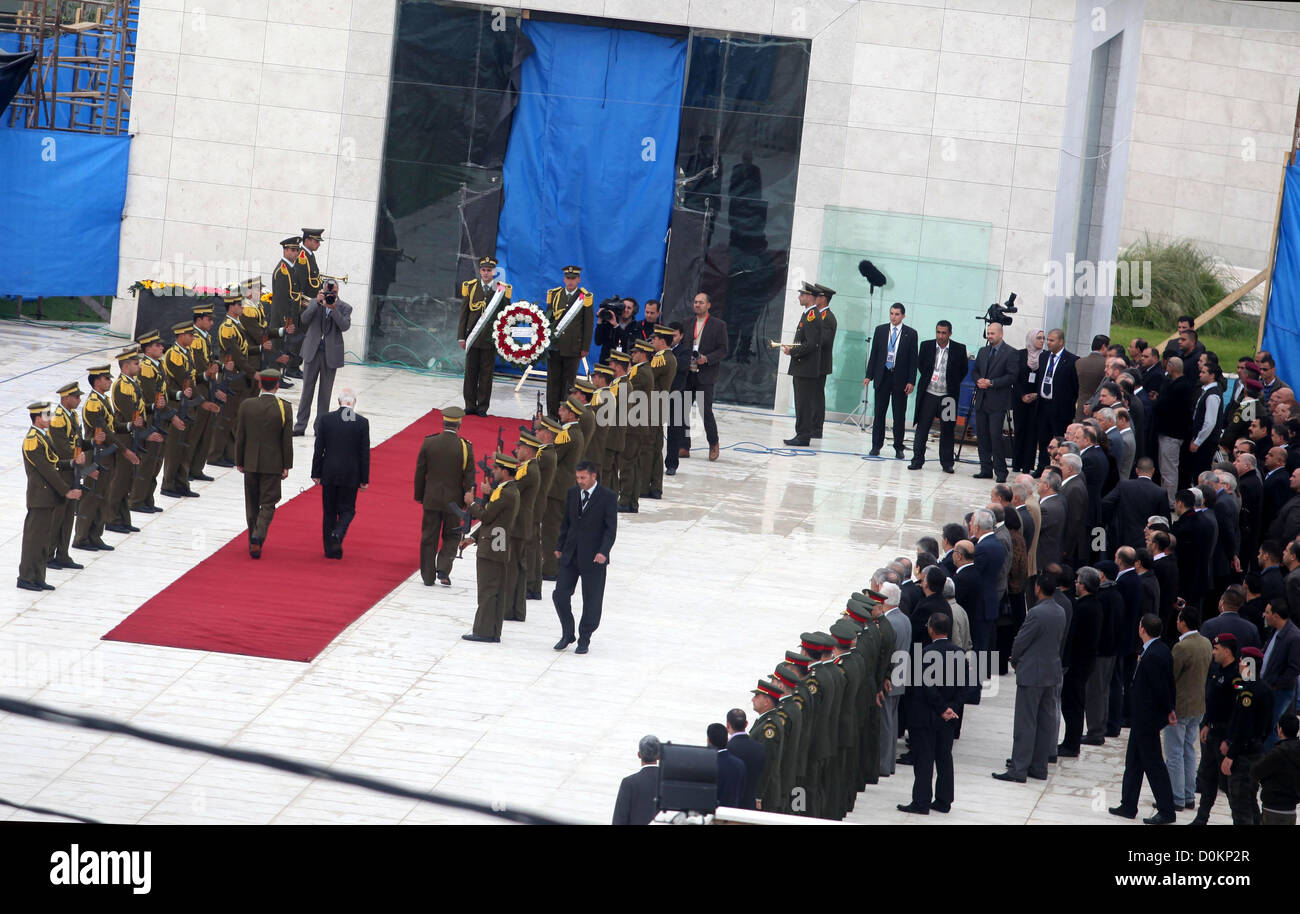 Nov. 27, 2012 - Ramallah, West Bank, Palestinian Territory - Palestinian presidency head Tayeb Abdelrahim (C-R) walks between lines of Palestinian honour guards standing to attention as he leaves the mausoleum of the late Palestinian leader Yasser Arafat, after a funeral ceremony on November 27, 2012, at the Muqataa in the West Bank city of Ramallah, following the exhumation of Arafat's body. The remains of the iconic Palestinian leader were exhumed, eight years after his death, and experts began taking samples to be tested for signs of poisoning  (Credit Image: © Issam Rimawi/APA Images/ZUMAP Stock Photo