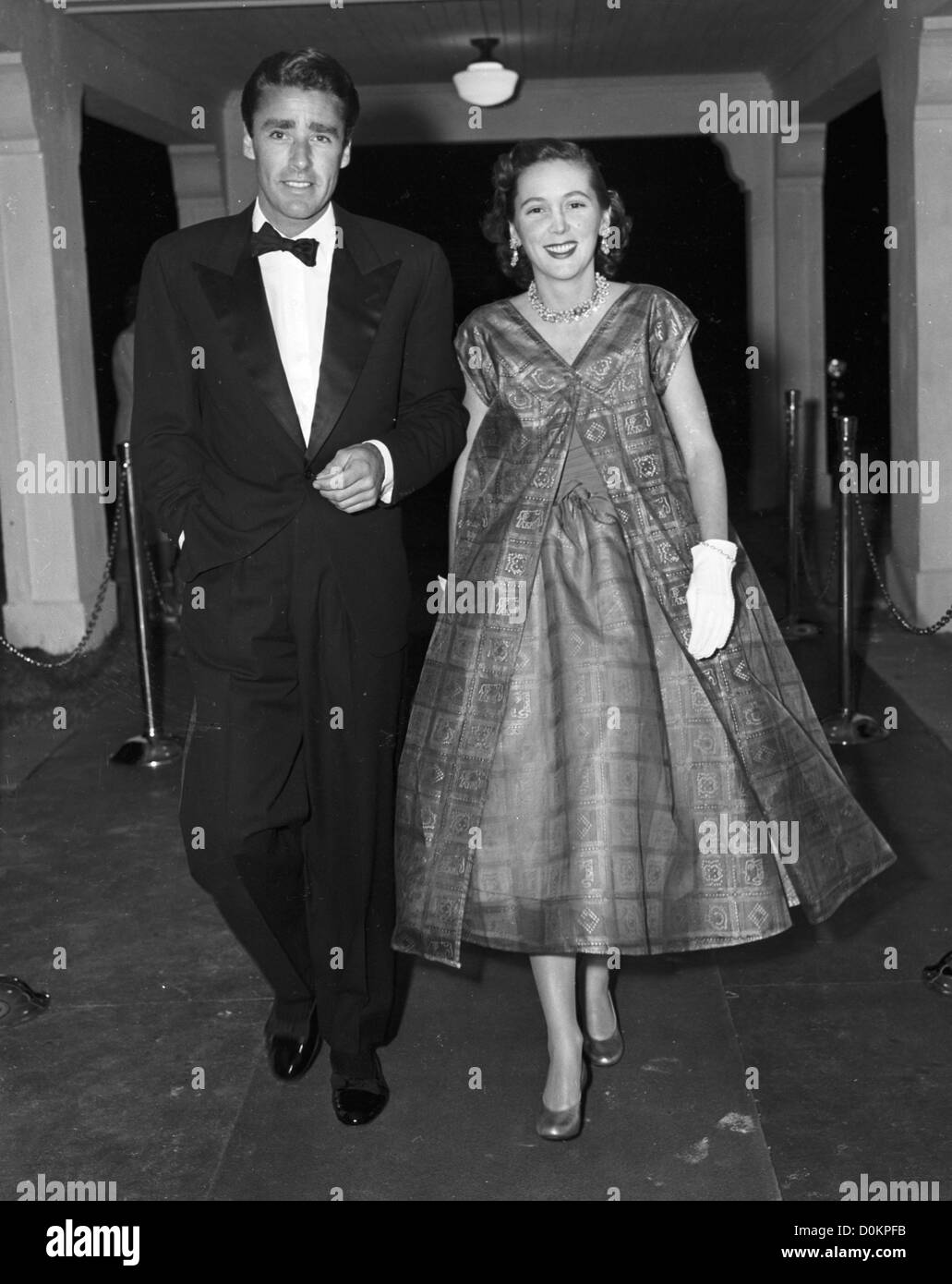 Peter Lawford and Mrs Earl E.T. Smith at the Theatre in Palm Beach, FL, ca 1950 (Photo by Bert Morgan/Bert Morgan Archive) Stock Photo
