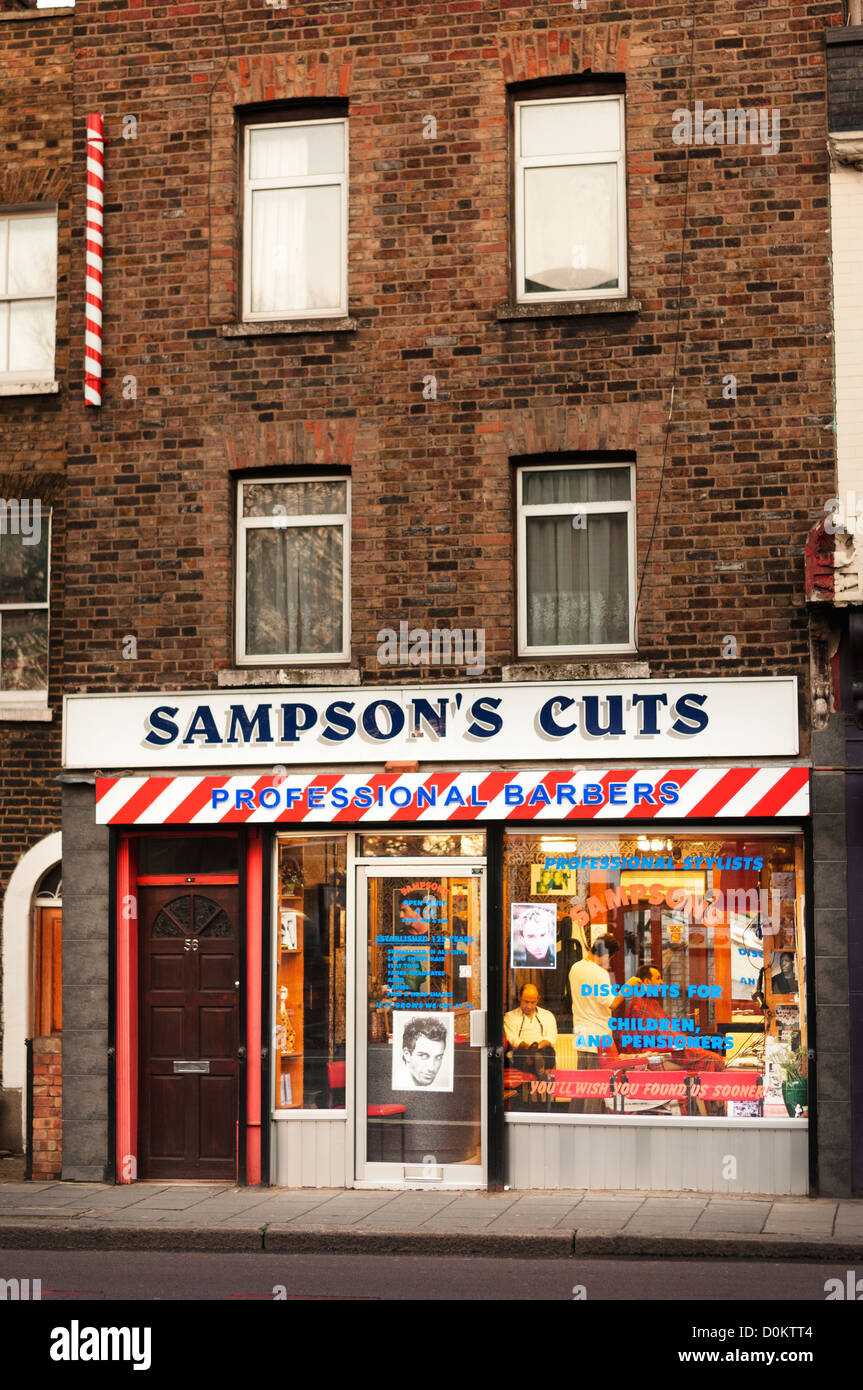 Exterior of Sampson's Cuts which is a local barbershop in Highbury. Stock Photo