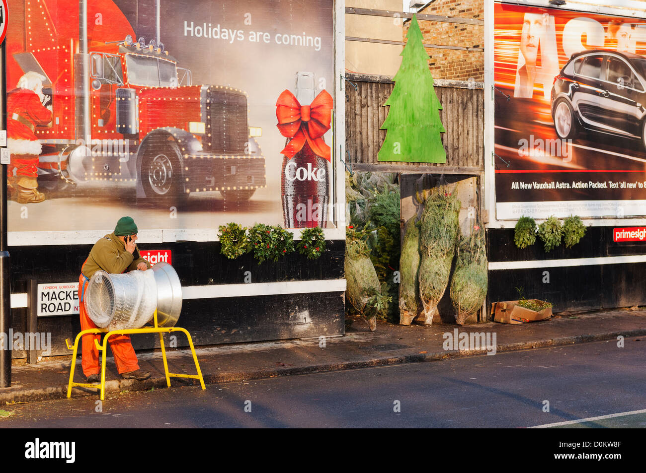 A Christmas tree salesman on Caledonian Road in Islington Stock Photo